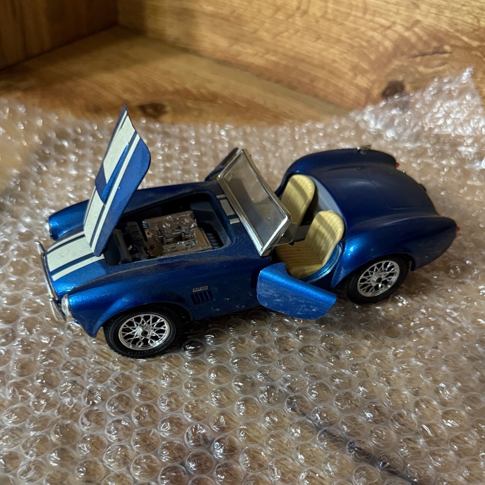Classic Blue Mustang Cobra Model Car with White Accents